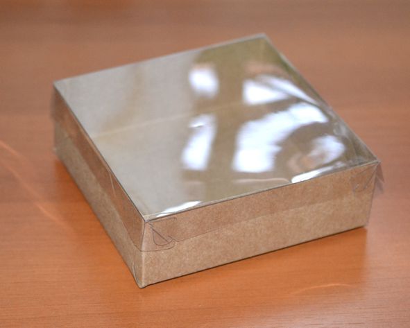 Caixa papel kraft tampa transparente - 15x15x5 cm (un)